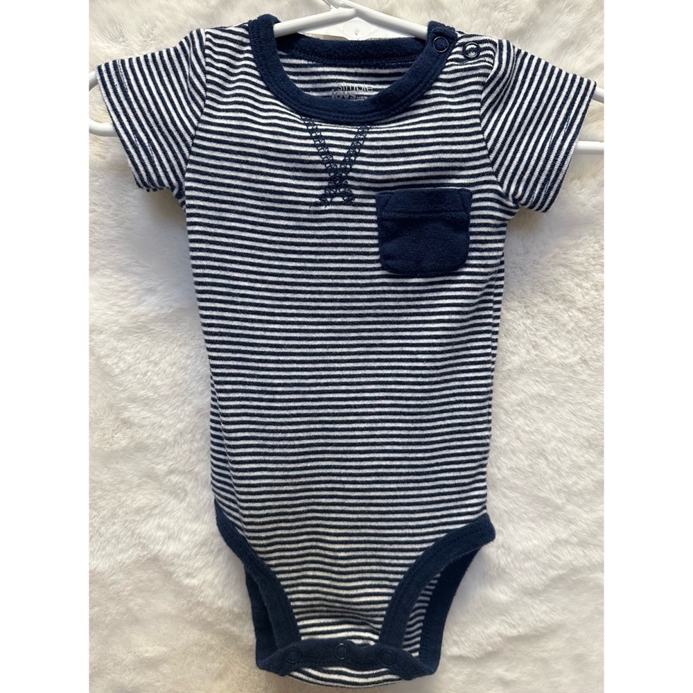Assorted onesies. - Picture 6 of 8
